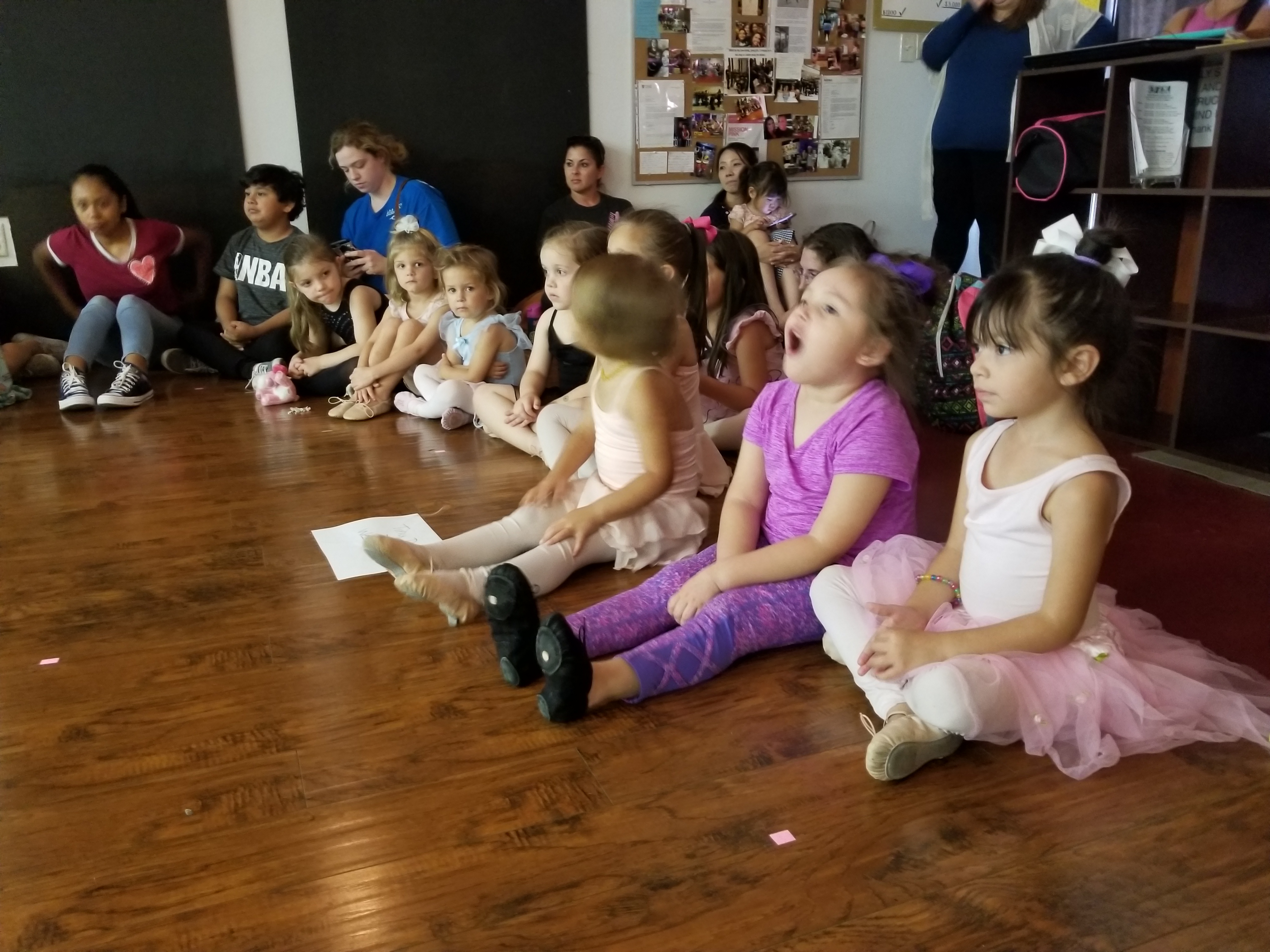 Young dancers seated at SMASH