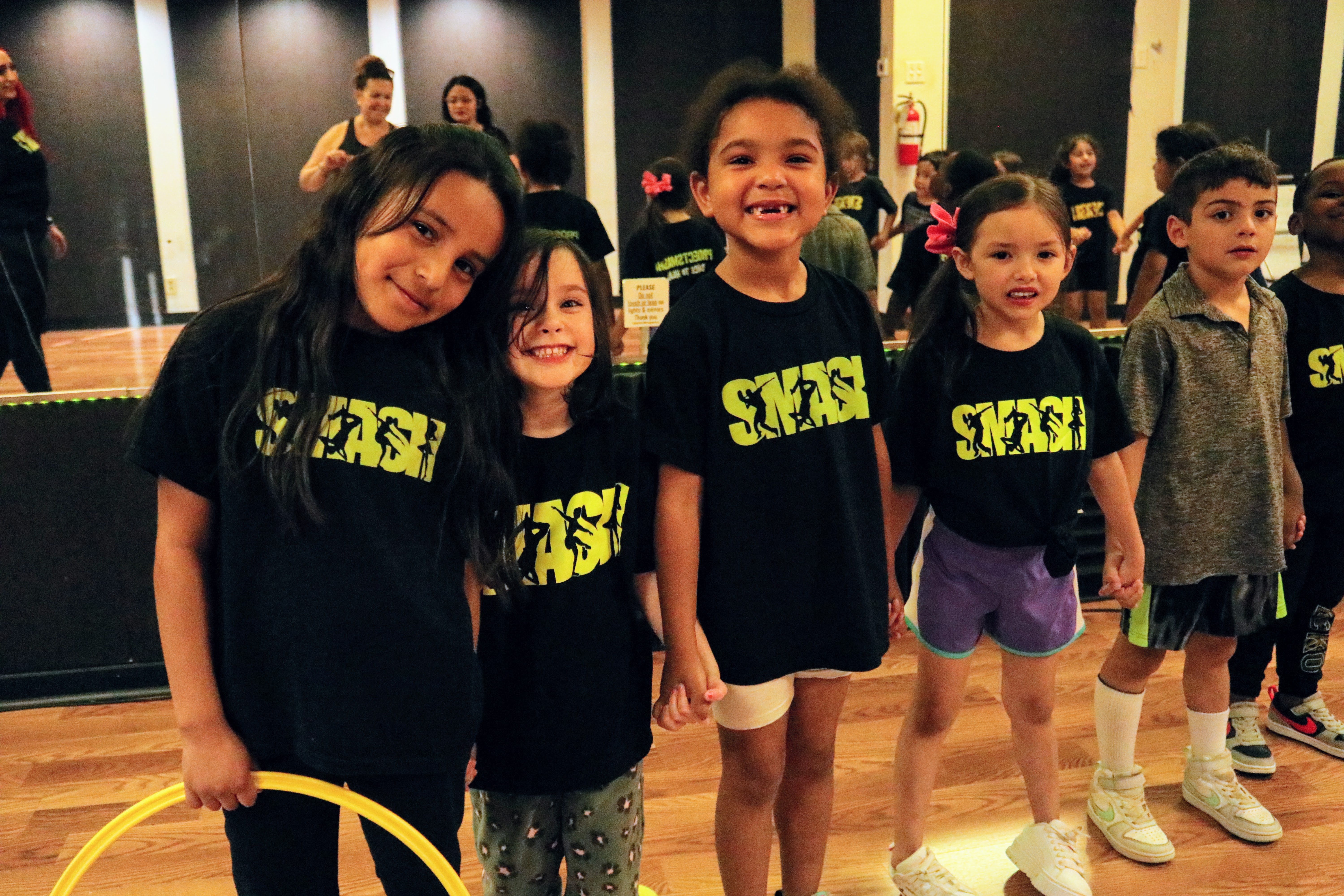 Kids smiling together at SMASH Dance Studio
