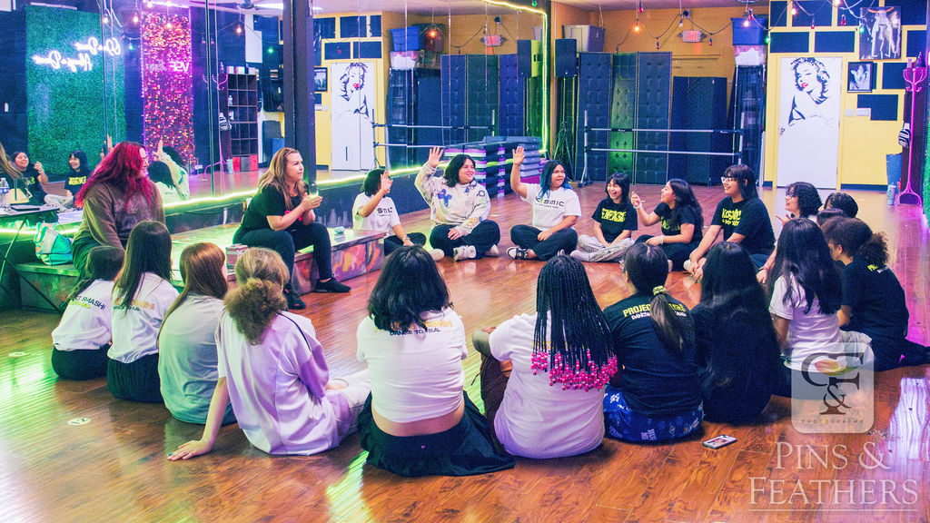 Students gathered in a circle during class