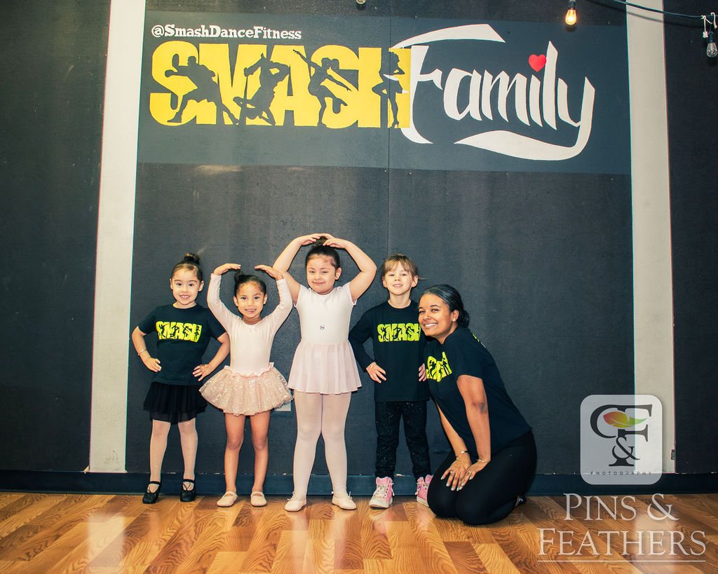 Young dancers posing after class