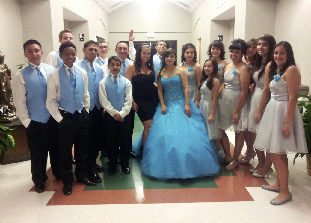 Quinceañera with her dance court